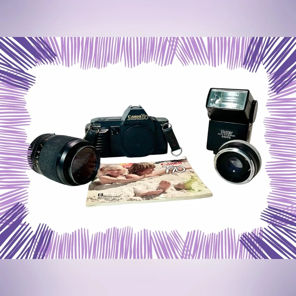 Canon T70 auto wind film camera with zoom lens , 2X converter and flash